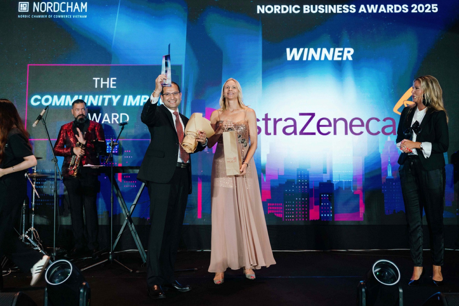 AstraZeneca Vietnam receiving the Community Impact Award