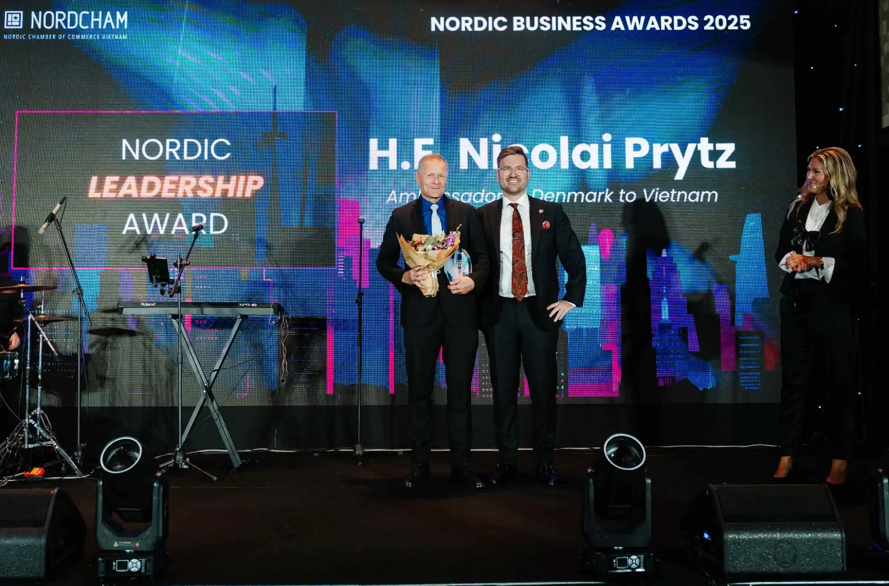 H.E. Nicolai Prytz, the Ambassador of Denmark to Vietnam receiving the Nordic Leadership Award